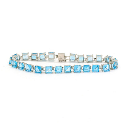 Classic Emerald-Cut Swiss Blue Topaz Bracelet with Diamonds | Angara