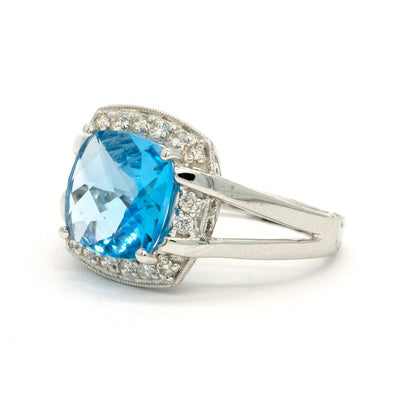 14KT White Gold 3.70CTW Cushion Cut Prong Set Blue Topaz and Diamond Halo Ring - Giorgio Conti Jewelers