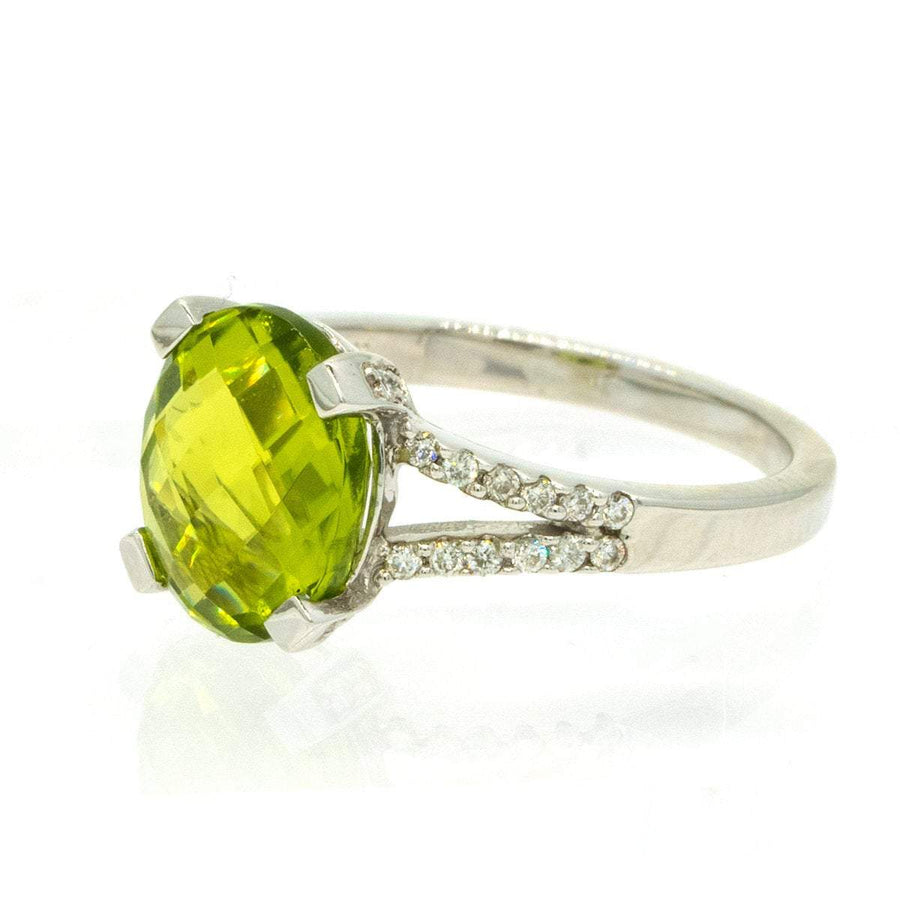 14KT White Gold 3.79ctw Oval Cut Prong Set Peridot and Diamond Ring - Giorgio Conti Jewelers