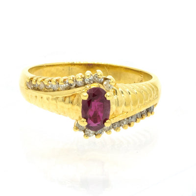 14KT Yellow Gold 0.87ctw Oval Cut Prong Set Ruby And Round Cut Diamond Ring - Giorgio Conti Jewelers