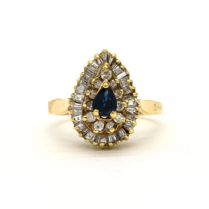 14KT Yellow Gold 1.12CTW Pear Shape Prong Set Natural Sapphire and Diamond Halo Ring - Giorgio Conti Jewelers