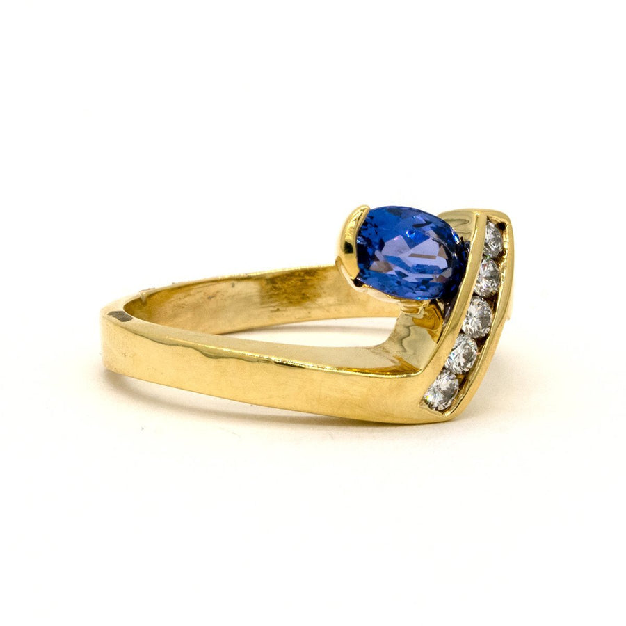 14KT Yellow Gold 1.24CTW Oval Cut Channel Set Natural Tanzanite and Diamond Ring - Giorgio Conti Jewelers
