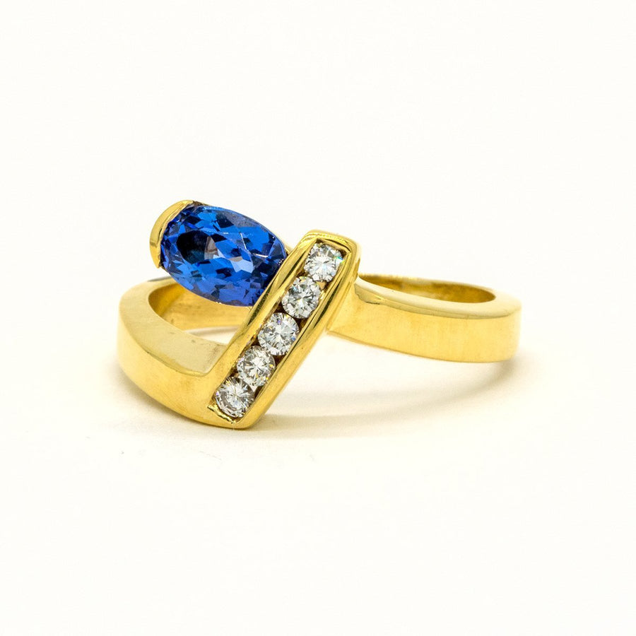 14KT Yellow Gold 1.24CTW Oval Cut Channel Set Natural Tanzanite and Diamond Ring - Giorgio Conti Jewelers