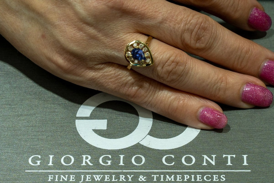 14KT Yellow Gold 1.35CTW Pear Shape Prong Set Natural Tanzanite and Diamond Halo Ring - Giorgio Conti Jewelers
