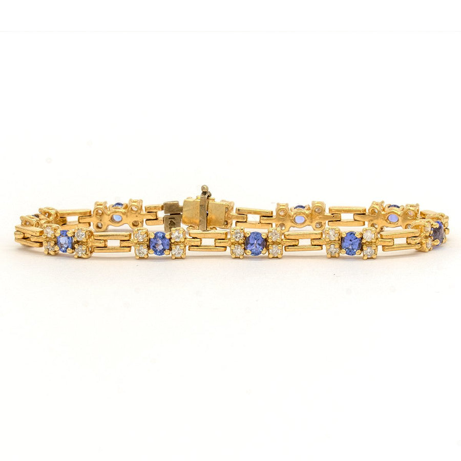 14KT Yellow Gold 3.76CTW Oval Cut Prong Set Natural Tanzanite and Diamond Tennis Bracelet - Giorgio Conti Jewelers