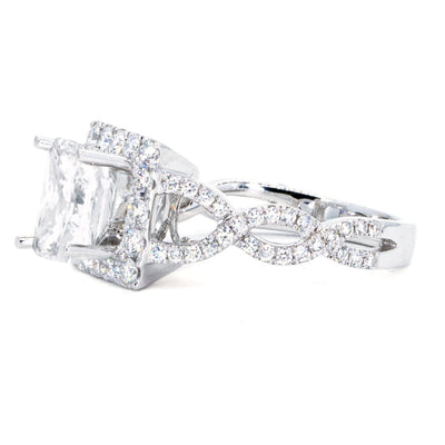 18KT White Gold 0.87ctw Princess Cut Prong Set Diamond Twist Engagement Ring - Giorgio Conti Jewelers