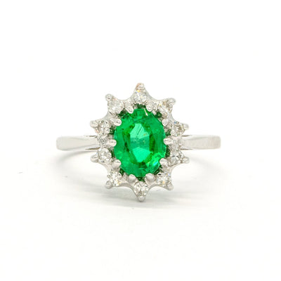 White Gold 1.35CTW Oval Cut Prong Set Natural Emerald and Diamond Halo Ring - Giorgio Conti Jewelers